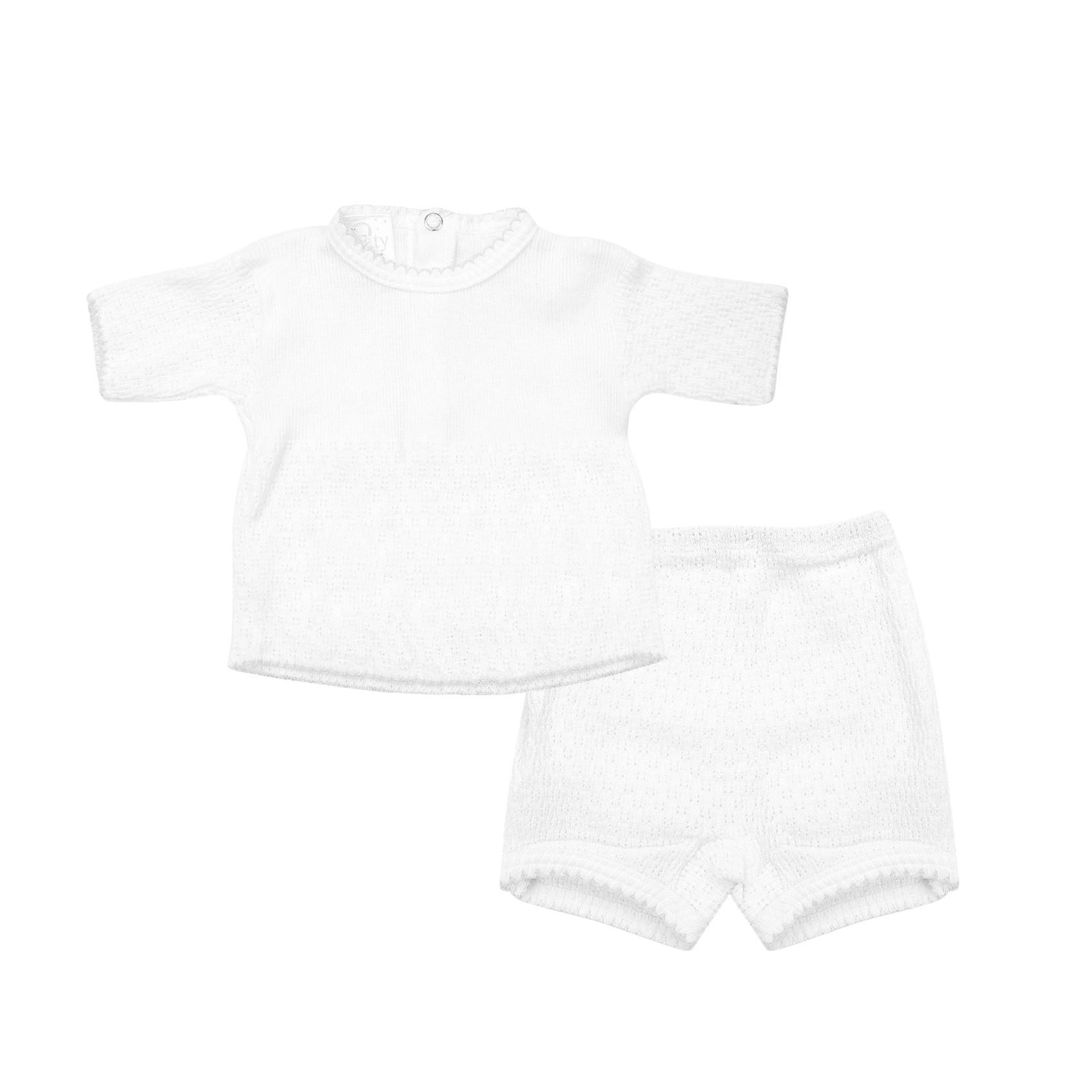 White baby onesie and shorts set on a white background