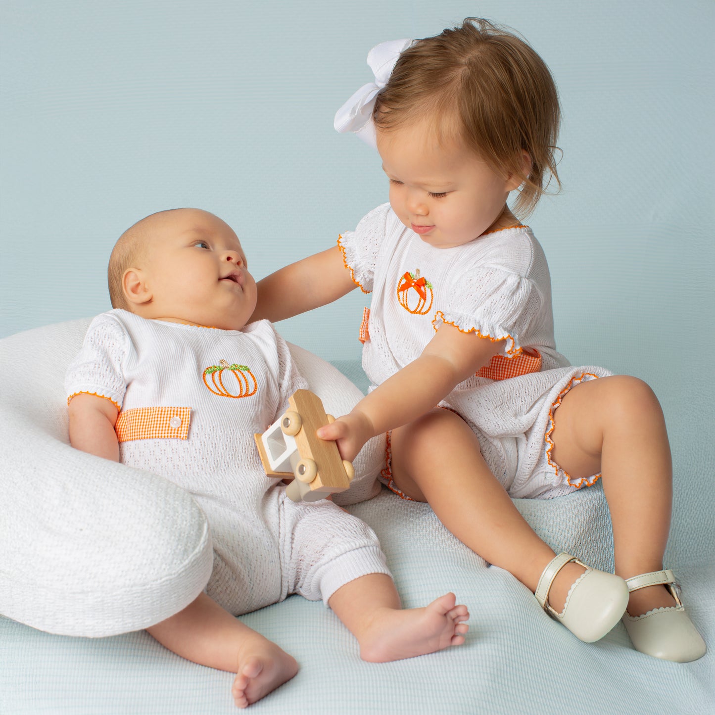Paty Knit Short Sleeve Romper with Pumpkin Embroidery and Gingham Tabs