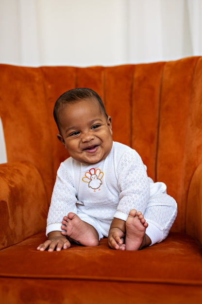 PatyKnit™ Long Sleeve Romper with Turkey Embroidery and Gingham Tabs