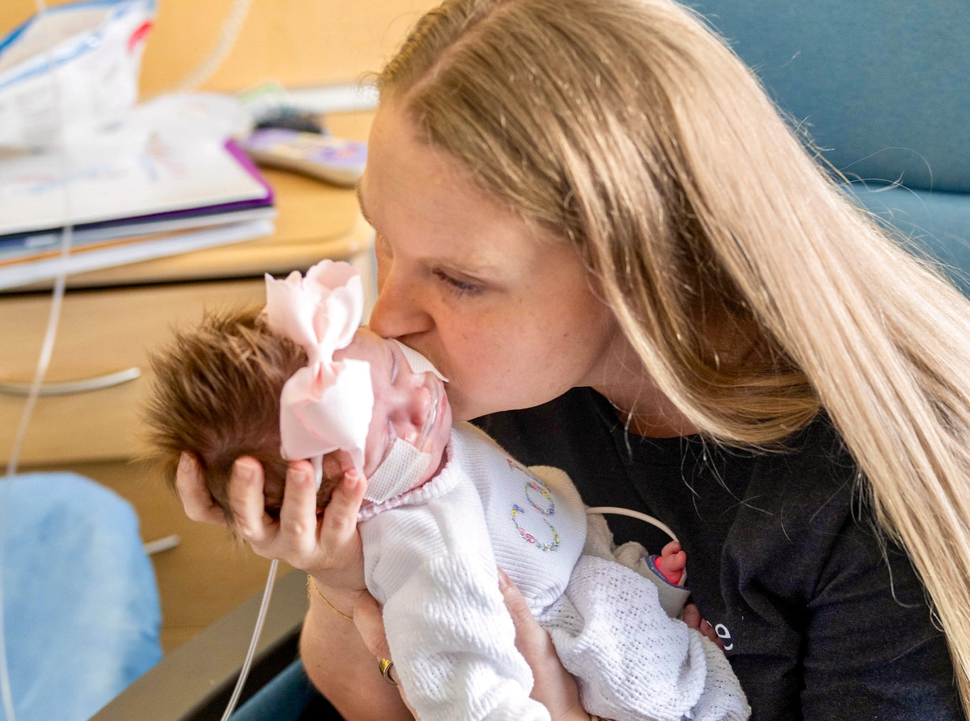 Blair holding baby Letty during her NICU stay